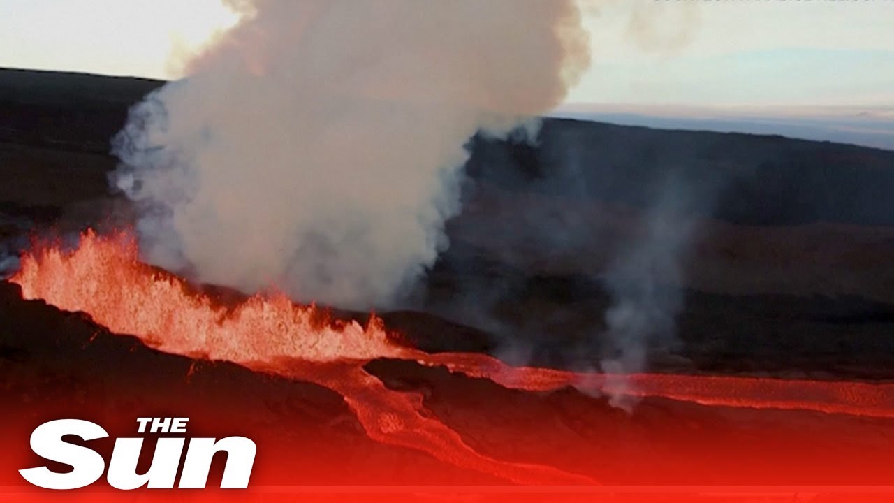 Hawaii’s Manua Loa volcano erupts sending molten lava toward local roads