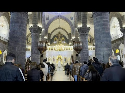 Syrian Christians attend first Sunday service since Assad's fall | AFP