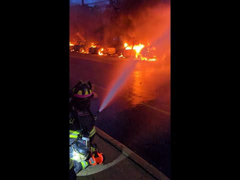 Fallen utility pole sparks blaze and burns seven cars