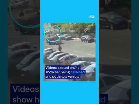 Young woman protests Iran’s dress code by stripping at university | DW News