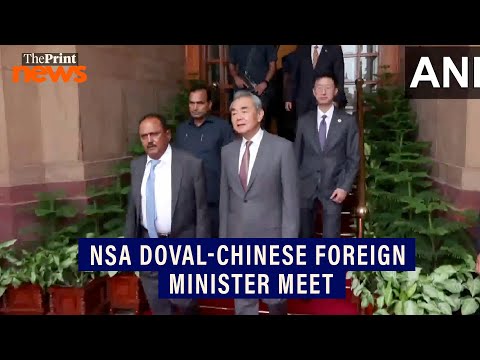 China's Foreign Minister Wang Yi departs from Hyderabad House after his meeting with NSA Doval