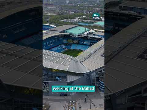 Manchester City fans divided as barman fired for wearing United shirt at derby game | ITV News