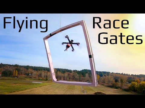 Floating FPV Race Gates Under Huge Drone - UCq2rNse2XX4Rjzmldv9GqrQ