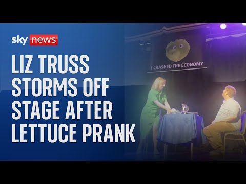 Liz Truss storms off stage after lettuce banner prank