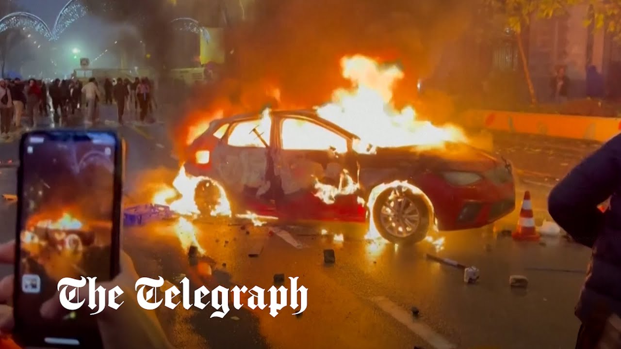 Rioters set alight cars in Brussels after Morocco beat Belgium at the World Cup