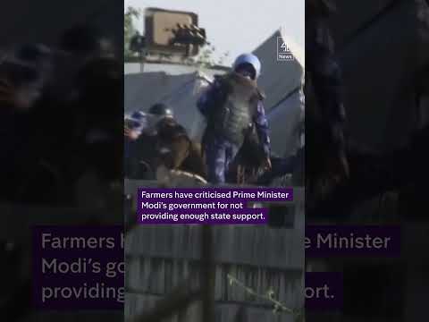Police fire tear gas at Indian farmers