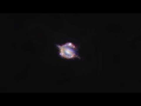 Gravitational Lens Reveals Distant Universe Galaxy Merger | Video - UCVTomc35agH1SM6kCKzwW_g