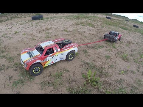 Traxxas Unlimited Desert Racer против Losi Super Baja Rey - UCX2-frpuBe3e99K7lDQxT7Q