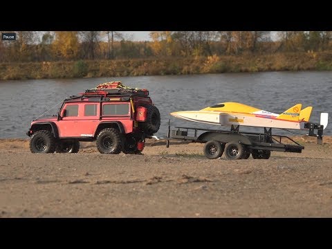 Спуск радиоуправляемой лодки на воду на Land Rover Defender (RC boat and TRX-4) - UCX2-frpuBe3e99K7lDQxT7Q