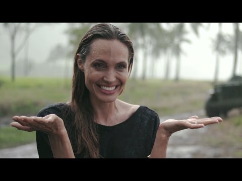 EXCLUSIVE: Angelina Jolie Gets Caught in the Rain Behind the Scenes of 'Unbroken' - UCdtXPiqI2cLorKaPrfpKc4g