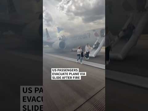 US passenger plane evacuated in Denver due to brake fire | AFP #shorts