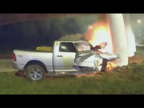 Police Officer Pulls Man Out of Burning Pick-Up Truck