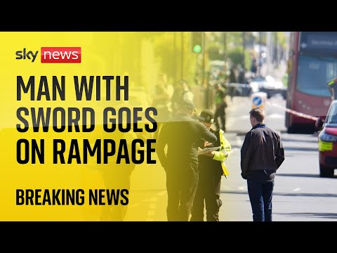 BREAKING NEWS: Man with sword 'attacks people and police officers' near Hainault station, London