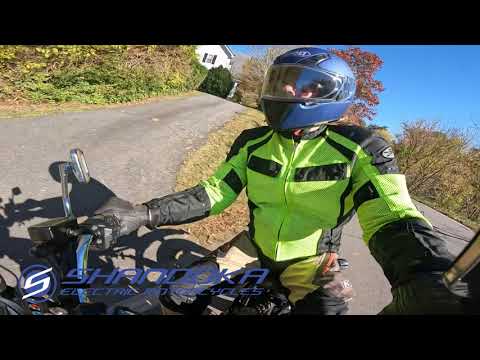 Mountain Road with Electric Motorcycle on a first sight running