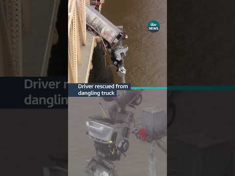 Firefighters rescued a woman from truck dangling over a bridge in Kentucky #itvnews #usa