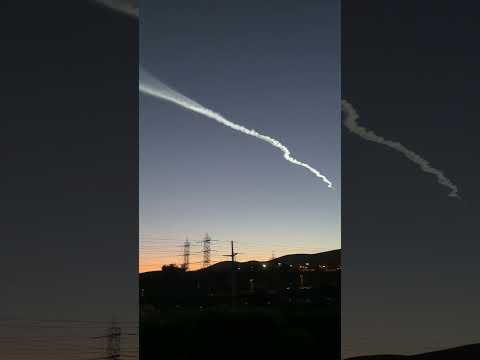 Spacex Falcon Rocket Launches Painting Glowing Trail In Twilight Sky