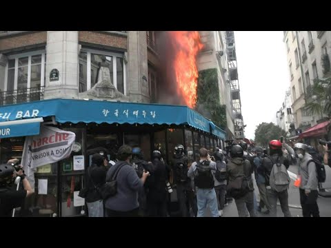 Facade of building burns in Paris during 'block everything' protest movement | AFP