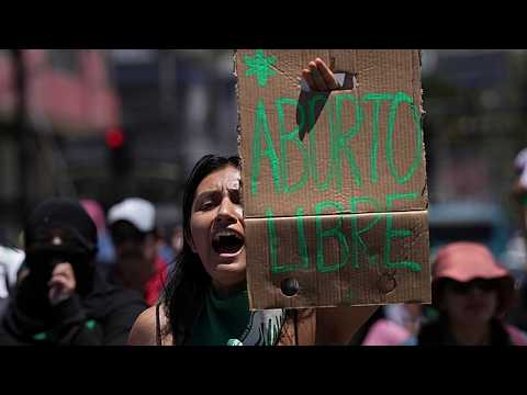 Protesters march for unrestricted abortion access in Chile and Colombia