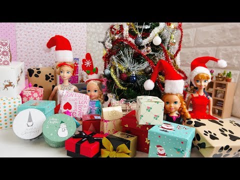 Elsa and Anna toddlers open their Christmas presents from Santa! - UCB5mq0ucfGe9dNCIC0s41QQ