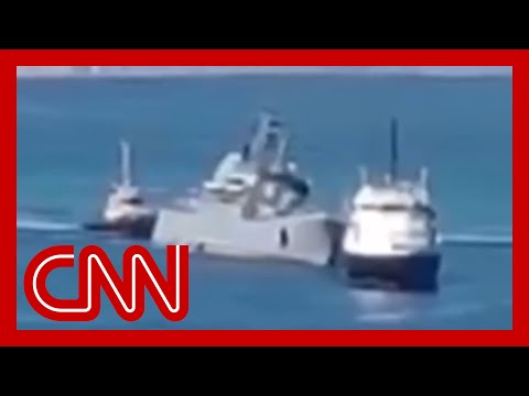 Video shows badly damaged Russian ship being towed to port