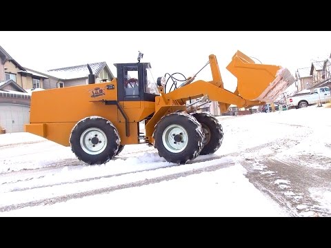 RC ADVENTURES - 500lb RC Wheel Loader clearing Snow- First Practice - UCxcjVHL-2o3D6Q9esu05a1Q