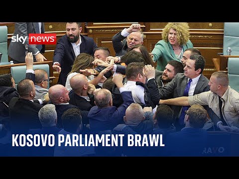 Huge brawl erupts in Kosovo parliament as opposition minister throws water at PM