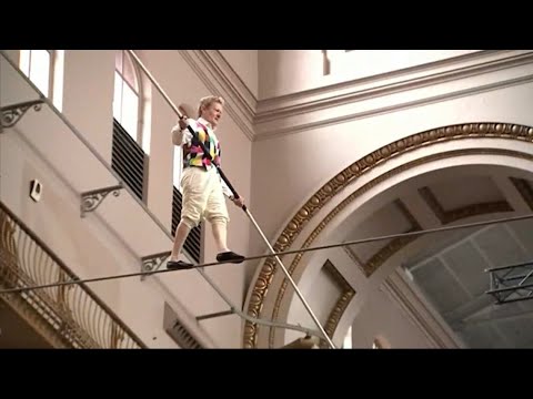 French high wire artist Philippe Petit performs at the National Building Museum in DC