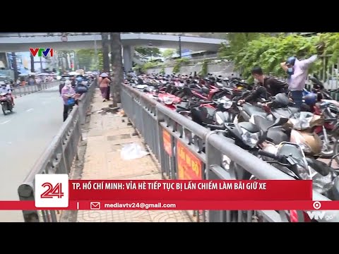 TP. Hồ Chí Minh: Vỉa hè tiếp tục bị lấn chiếm làm bãi giữ xe | VTV24