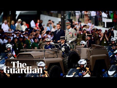 Emmanuel Macron is booed during Bastille Day parade in Paris