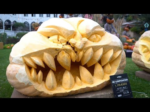 Giant pumpkins are carved for Copenhagen's annual Halloween competition | AFP