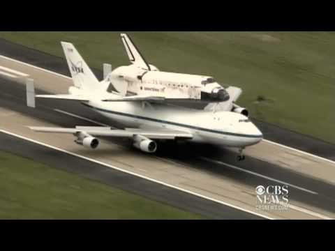 Space shuttle Discovery's final flight over D.C. - UClzCn8DxRSCuMFv_WfzkcrQ