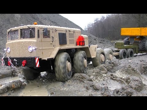 MAZ 537 AND KAT1 IN ACTION, HEAVY RC TRUCKS WORK IN THE RAIN, RC MUDDING - UCT4l7A9S4ziruX6Y8cVQRMw