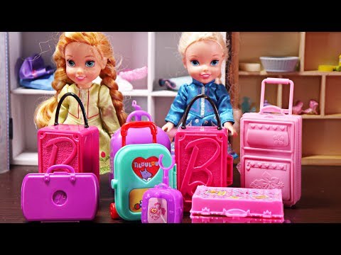 Elsa and Anna toddlers go on holidays and pack their suitcases - UCB5mq0ucfGe9dNCIC0s41QQ