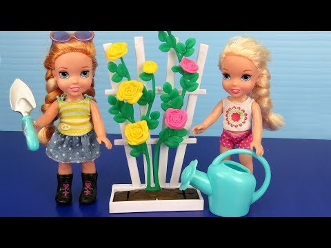 GARDENING ! Elsa and Anna toddlers plant flowers and vegetable seeds - UCQ00zWTLrgRQJUb8MHQg21A