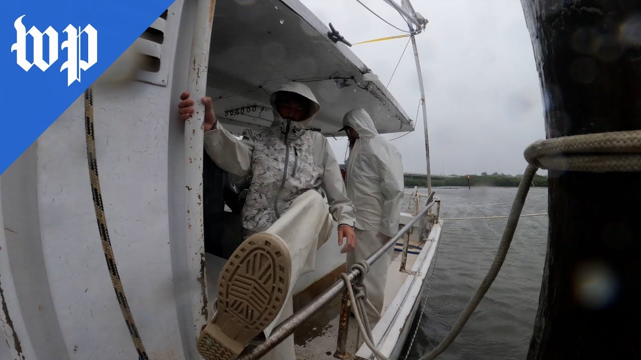 Florida fishermen ride out Hurricane Ian on their boat