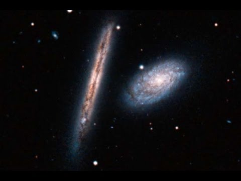 Hubble Snaps Pair of Spiral Galaxies - UCVTomc35agH1SM6kCKzwW_g