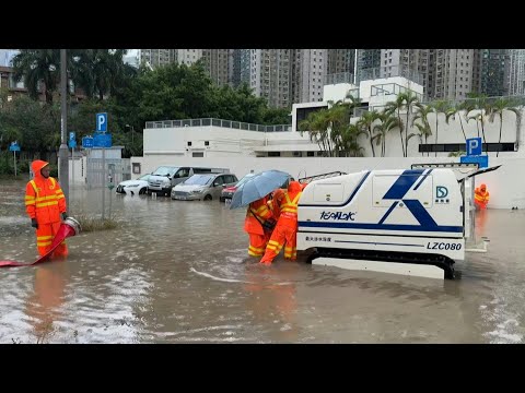 Hong Kong streets inundated with floodwater after heavy rain | AFP