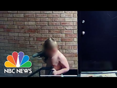 Security video shows toddler waving around loaded gun