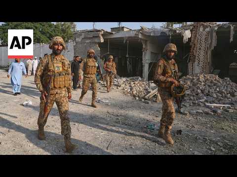 At least 21 dead in a bombing at a mosque near police offices in Pakistan