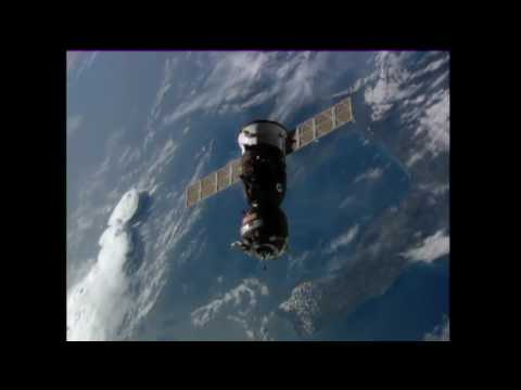 New Crew Arrives At Space Station - Docking Video - UCVTomc35agH1SM6kCKzwW_g