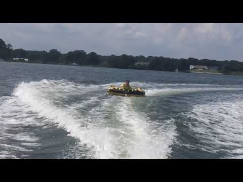 Teen with autism on the river and using aac communication