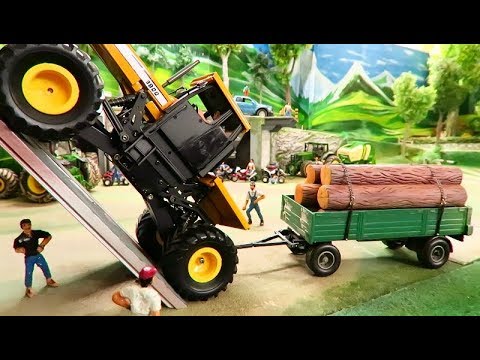 RC TRACTOR CLIMBING TEST at 100% slope - Amazing rc Toy Action on the Farm - UCmlTIlYhEGngvGn6quI8scg