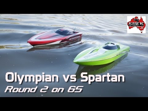 Thunder Tiger Olympian vs Traxxas Spartan Running 6S on Calm Water - UCOfR0NE5V7IHhMABstt11kA