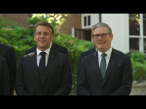 Macron and Starmer pose for photos at start of UK-France summit in London | AFP