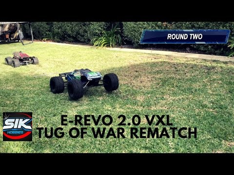 Traxxas E-Revo vs E-revo 2 0 Grudge match with tire swap - UCFORGItDtqazH7OcBhZdhyg