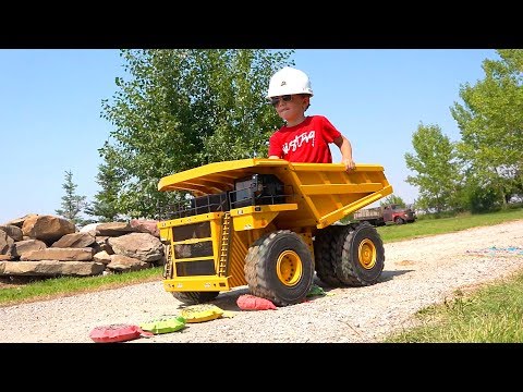 MOE CRUSHES w/a 300 LB DUMP TRUCK! RC4WD 797F MINE TRUCK | RC ADVENTURES - UCxcjVHL-2o3D6Q9esu05a1Q