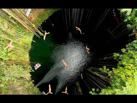 Group Cliff Dive into the Ik Kil Cenote - UCblfuW_4rakIf2h6aqANefA