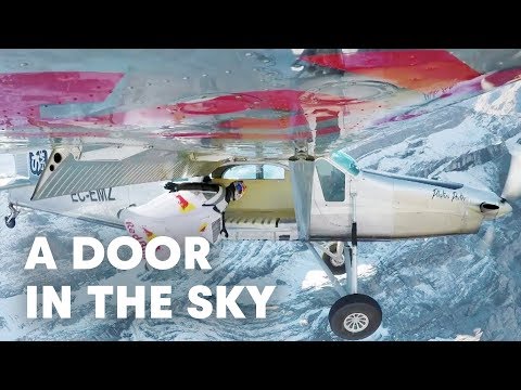 2 wingsuit flyers BASE jump into a plane in mid-air. | A Door In The Sky - UCblfuW_4rakIf2h6aqANefA