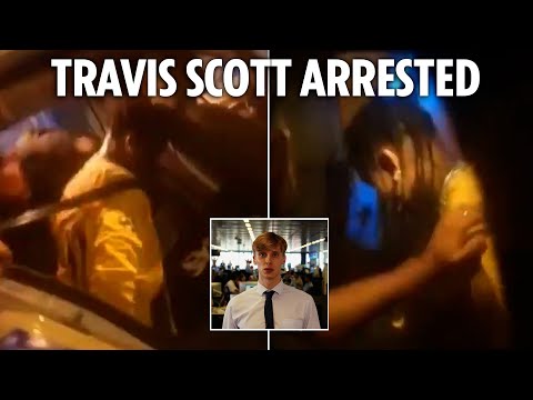 Watch Travis Scott hauled into cop car as he's arrested following brawl in Paris