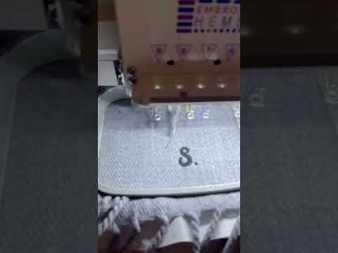 Embroidery machine in action.